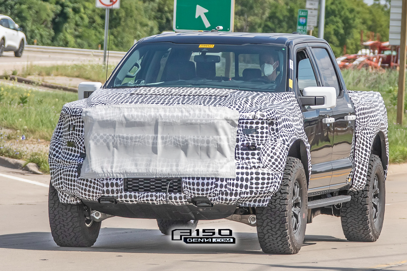 Ford F-150 2022 F-150 Raptor Prototype with New Coil Spring Rear Suspension Breaks Cover! 2021-F-150-Raptor-Prototype-Suspension-Spied-6