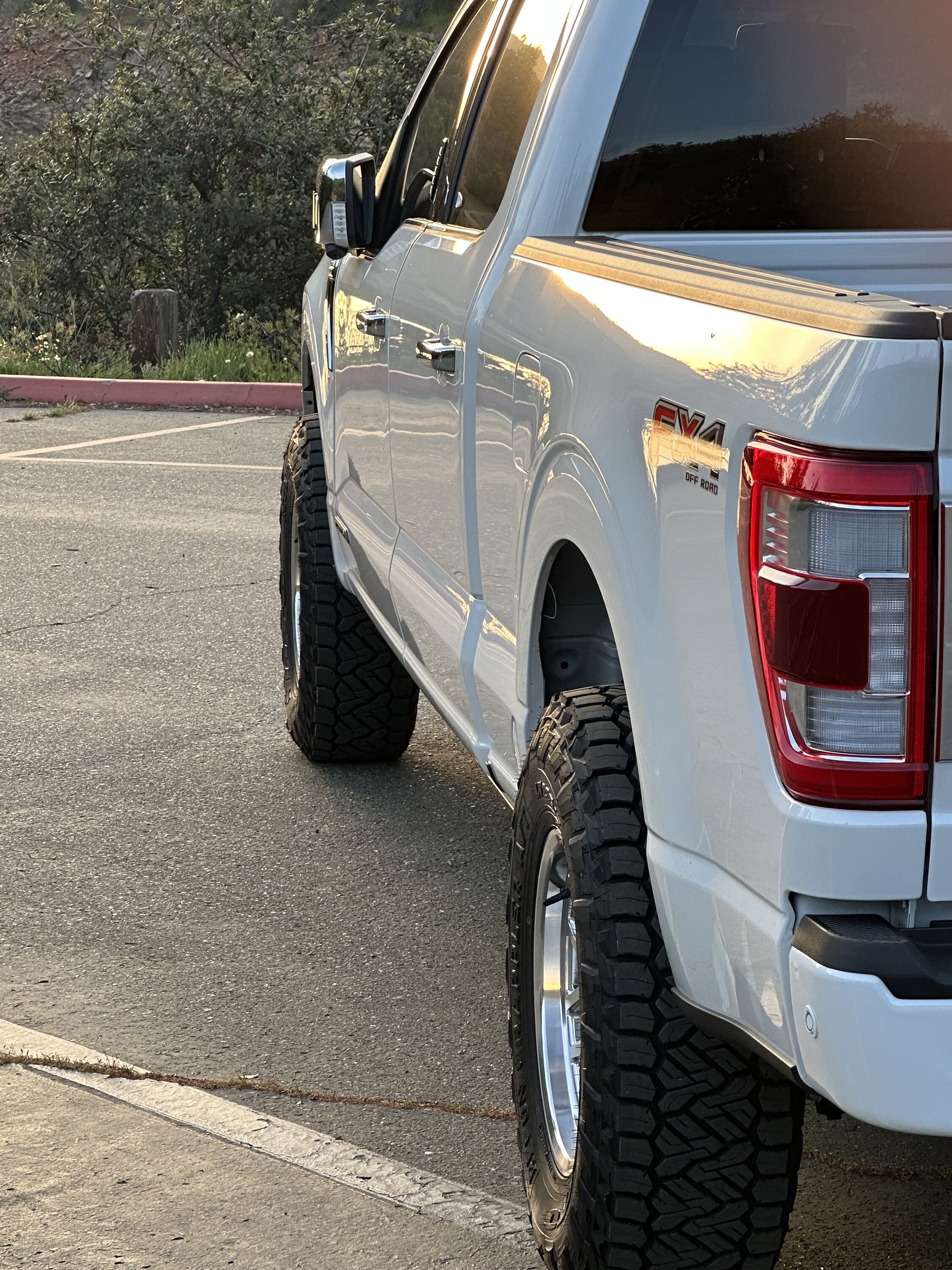 Ford F-150 ‘23 Platinum PowerBoost F-150 with: KMC446 wheels, Nitto Recon Grapplers. Ford Performance (Bilstein) Leveling Kit 9E71FCF3-E275-4600-86FC-E87DF079A75E